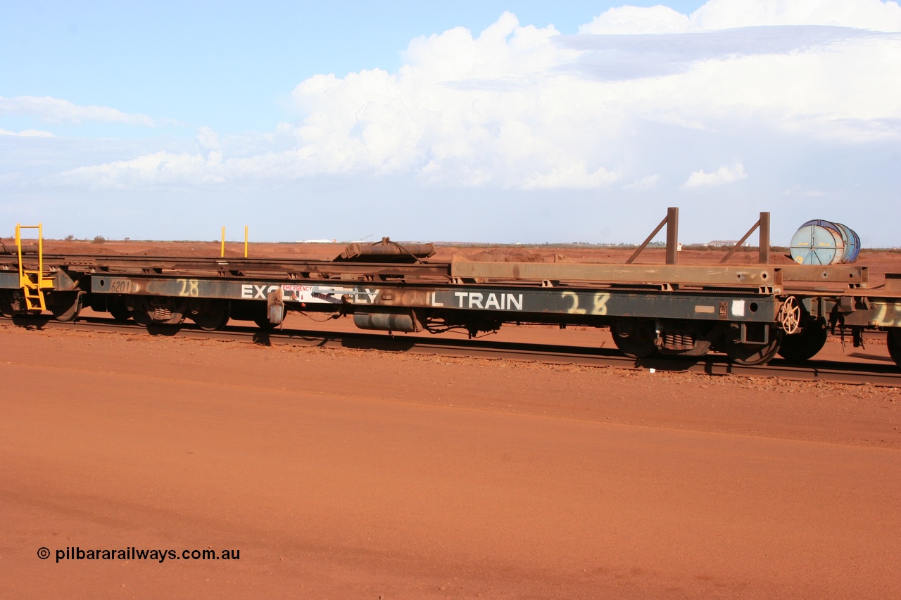 050319 0143
Nelson Point, rail recovery and transport train, 2nd lead off waggon 6201, built by Comeng WA, the mesh guarding is for the winch cable. The chute arrangement for the discharging and recovery of rail is visible.
Keywords: Comeng-WA;BHP-rail-train;