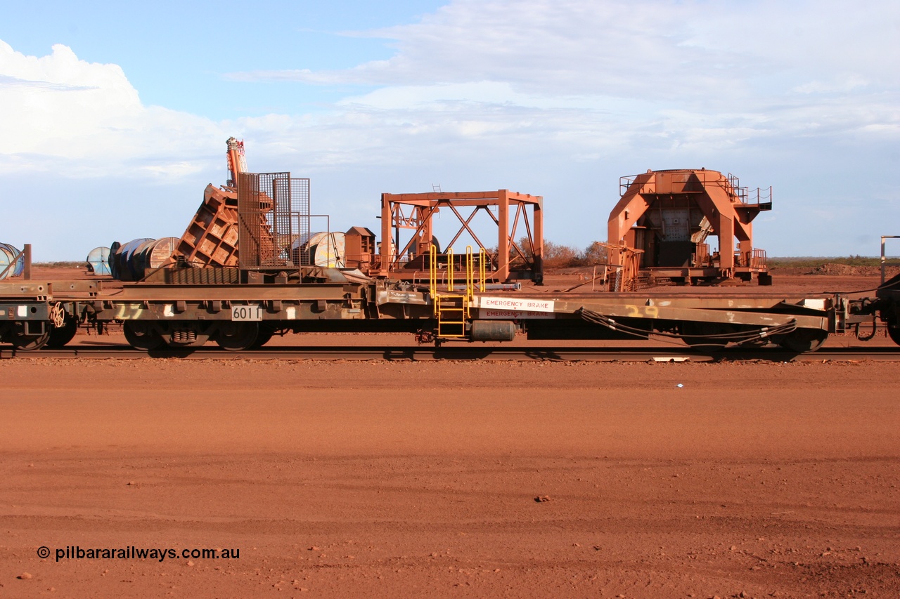 050319 0144
Nelson Point, rail recovery and transport train, 1st lead off waggon 6011, built by Scotts of Ipswich 04-09-1970, the mesh guarding is for the winch cable. The chute arrangement for the discharging and recovery of rail is visible.
Keywords: Scotts-Qld;BHP-rail-train;
