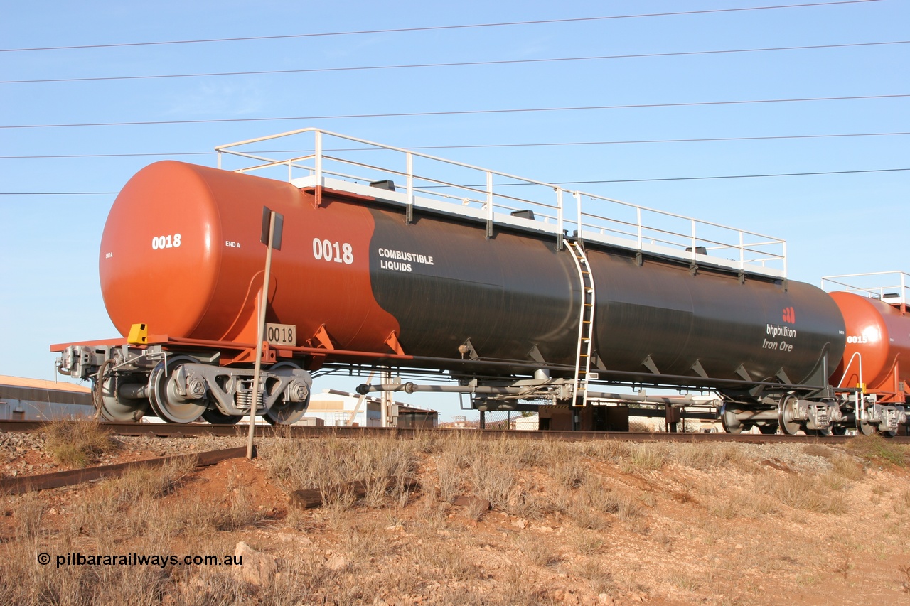 050410 0536
Nelson Point, tanker filling area, fuel tank waggon 0018, a Comeng WA built 114 kilolitre tank waggon, one of a batch of three built in 1974-75 wearing the newer corporate 'Earth' livery of BHP Billiton Iron Ore.
Keywords: Comeng-WA;BHP-tank-waggon;