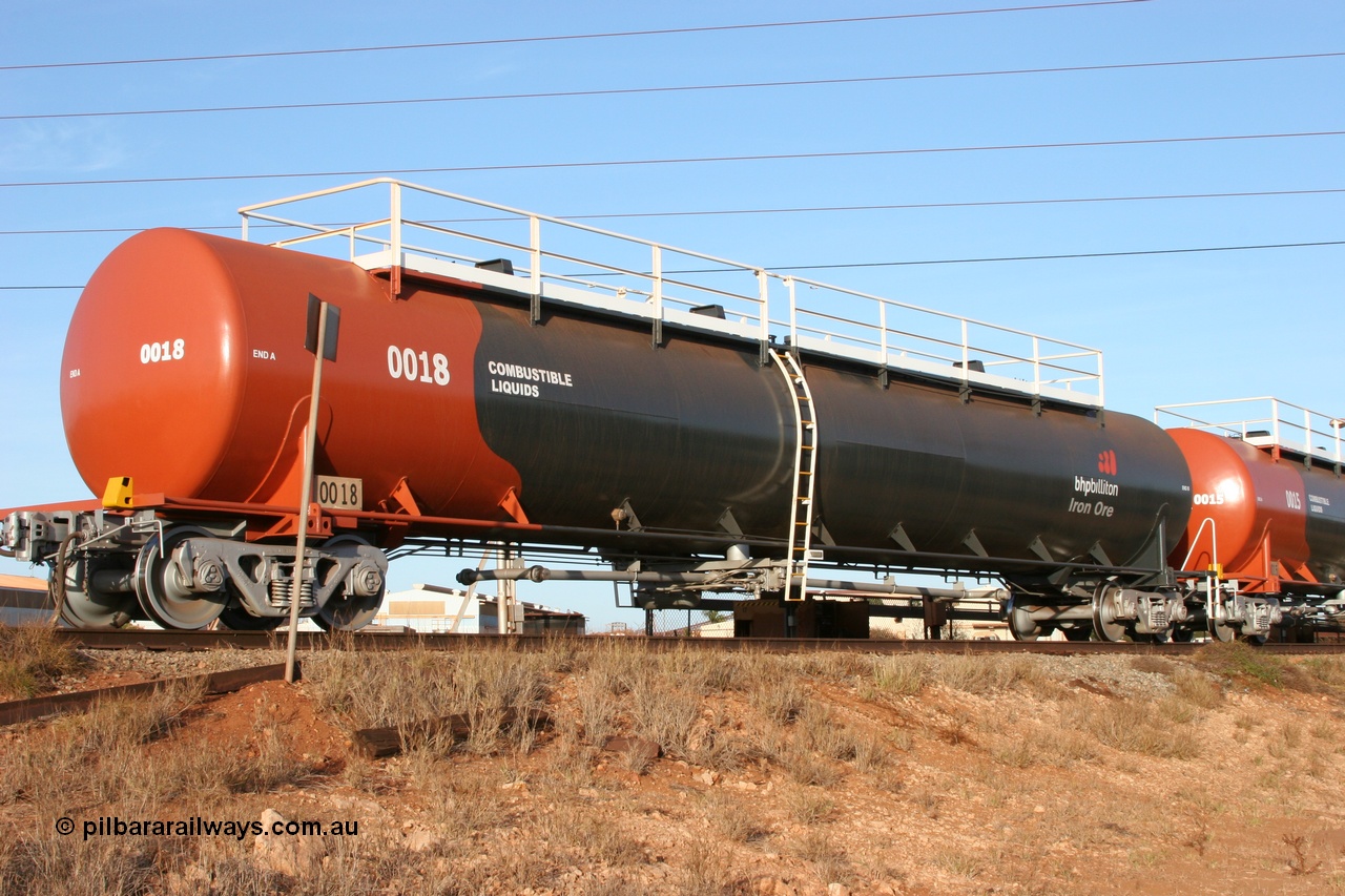 050410 0537
Nelson Point, tanker filling area, fuel tank waggon 0018, a Comeng WA built 114 kilolitre tank waggon, one of a batch of three built in 1974-75 wearing the newer corporate 'Earth' livery of BHP Billiton Iron Ore.
Keywords: Comeng-WA;BHP-tank-waggon;