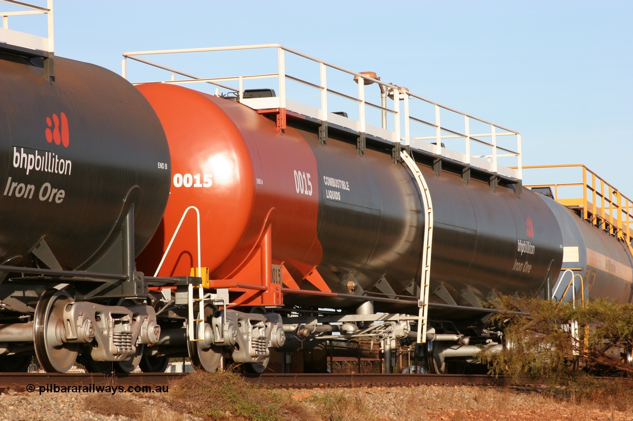 050410 0540
Nelson Point, tanker filling area, fuel tank waggon 0015, a Comeng NSW built 112 kilolitre tank waggon, one of a batch of four built in 1972 wearing the newer corporate 'Earth' livery of BHP Billiton Iron Ore.
Keywords: Comeng-WA;BHP-tank-waggon;