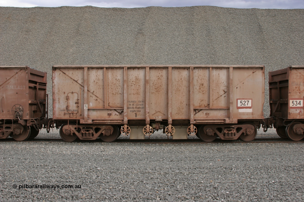 050412 0750
Quarry 8, Shaw Siding area. Side view of 1963 built Magor USA waggon 527, originally in ore service before conversion to a ballast waggon.
Keywords: Magor-USA;BHP-ballast-waggon;