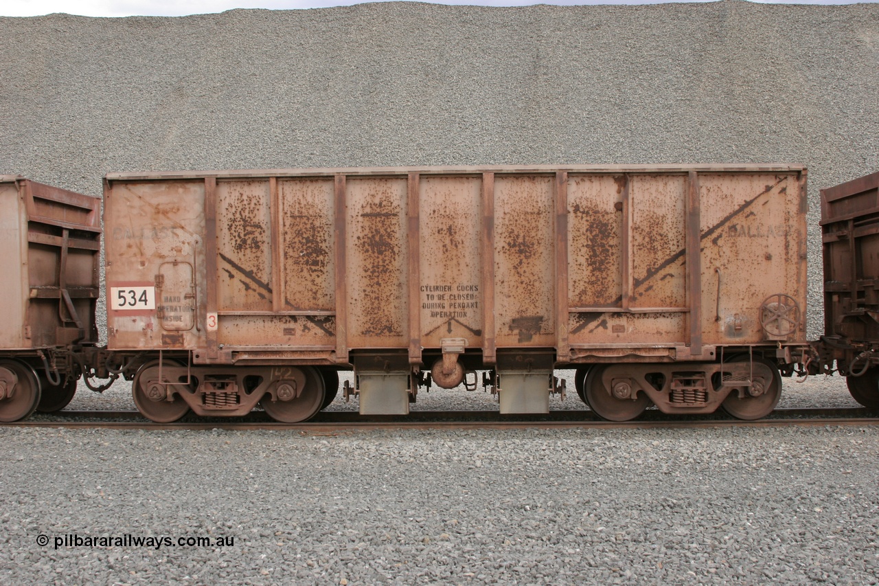 050412 0752
Quarry 8, Shaw Siding area. Side view of 1963 built Magor USA waggon 534, originally in ore service before conversion to a ballast waggon.
Keywords: Magor-USA;BHP-ballast-waggon;