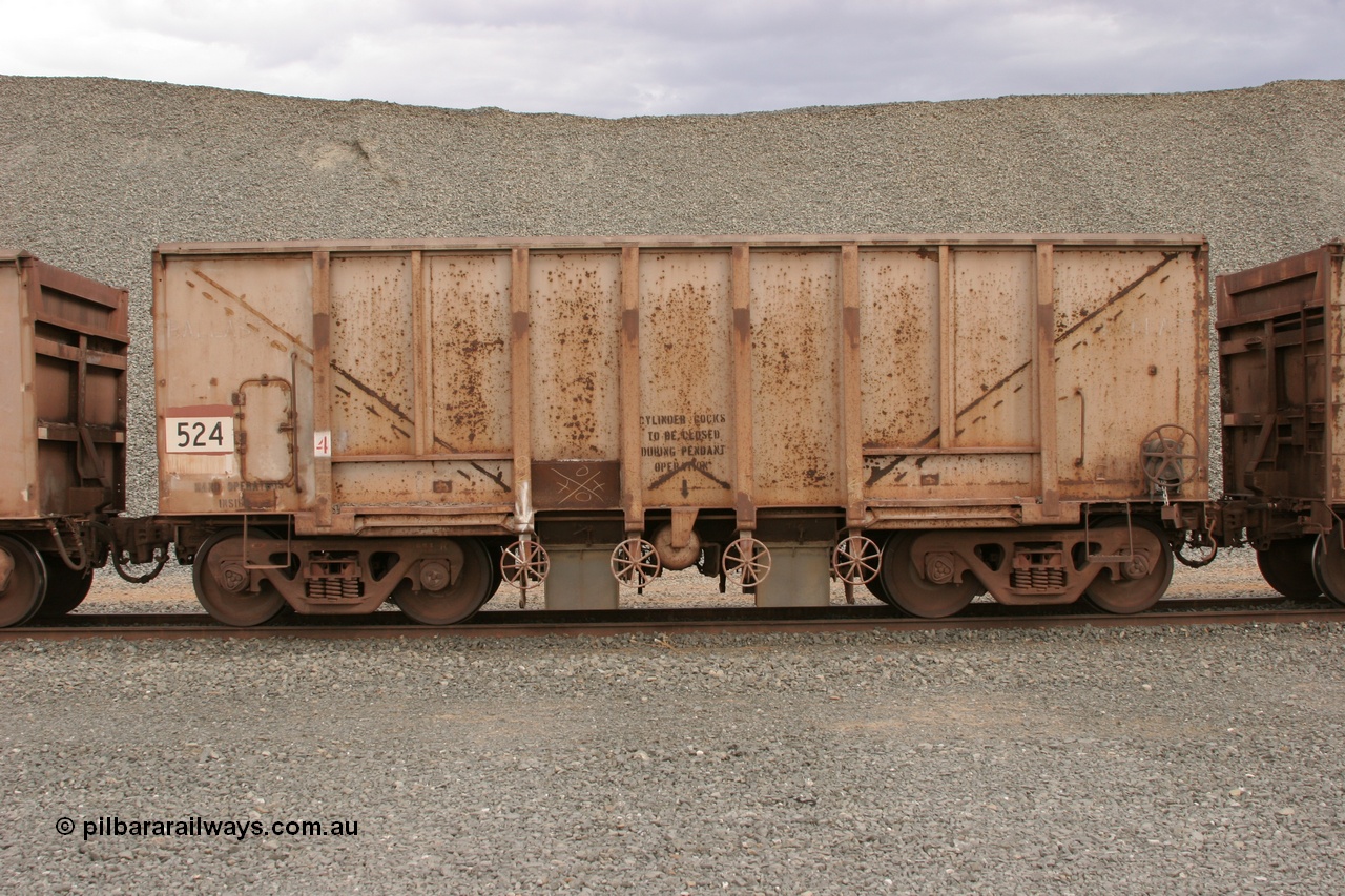 050412 0766
Quarry 8, Shaw Siding area. Side view of 1963 built Magor USA waggon 524, originally in ore service before conversion to a ballast waggon.
Keywords: Magor-USA;BHP-ballast-waggon;