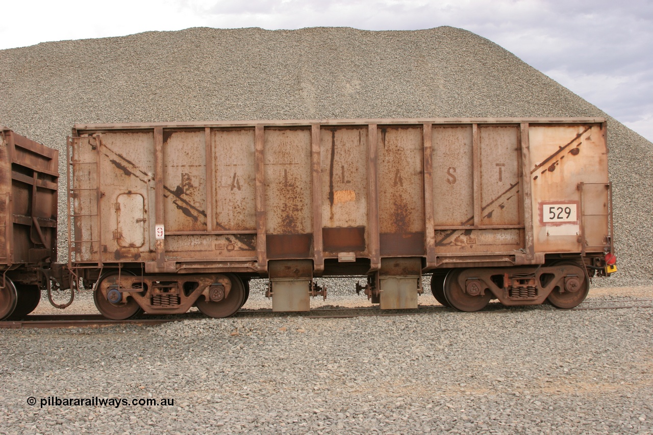 050412 0774
Quarry 8, Shaw Siding area. Side view of 1963 built Magor USA waggon 529, originally in ore service before conversion to a ballast waggon.
Keywords: Magor-USA;BHP-ballast-waggon;