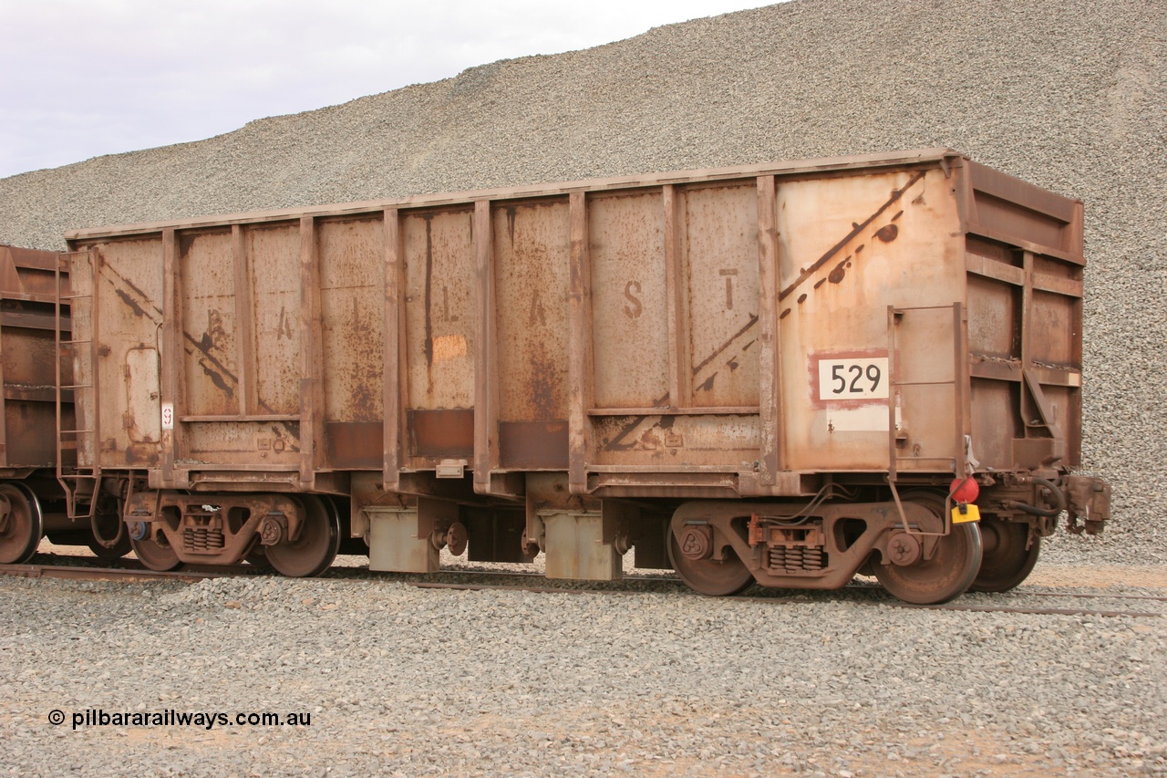 050412 0776
Quarry 8, Shaw Siding area. 3/4 view of 1963 built Magor USA waggon 529, originally in ore service before conversion to a ballast waggon.
Keywords: Magor-USA;BHP-ballast-waggon;
