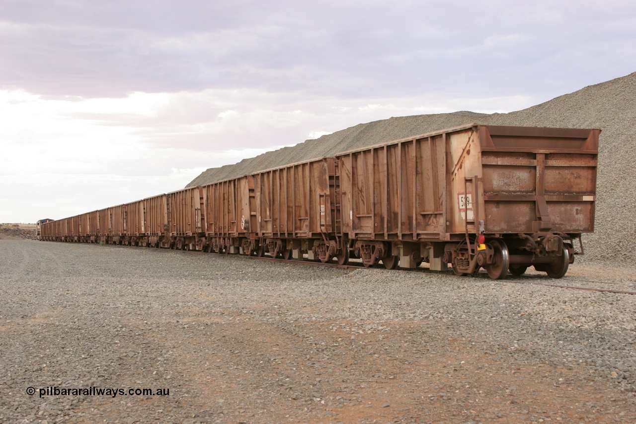 050412 0778
Quarry 8 loading area, view from rear of train with Magor USA built ballast rake.
Keywords: Magor-USA;BHP-ballast-waggon;