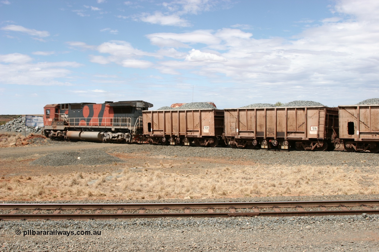 050421 1383
Quarry 8, Shaw Siding area, Dash 8 unit 5636 shunts the loaded ballast rake under the water point on the south leg of the triangle. Original Magor USA built ballast cars 516 and 504 dating from a 1963 build.
Keywords: Magor-USA;BHP-ballast-waggon;
