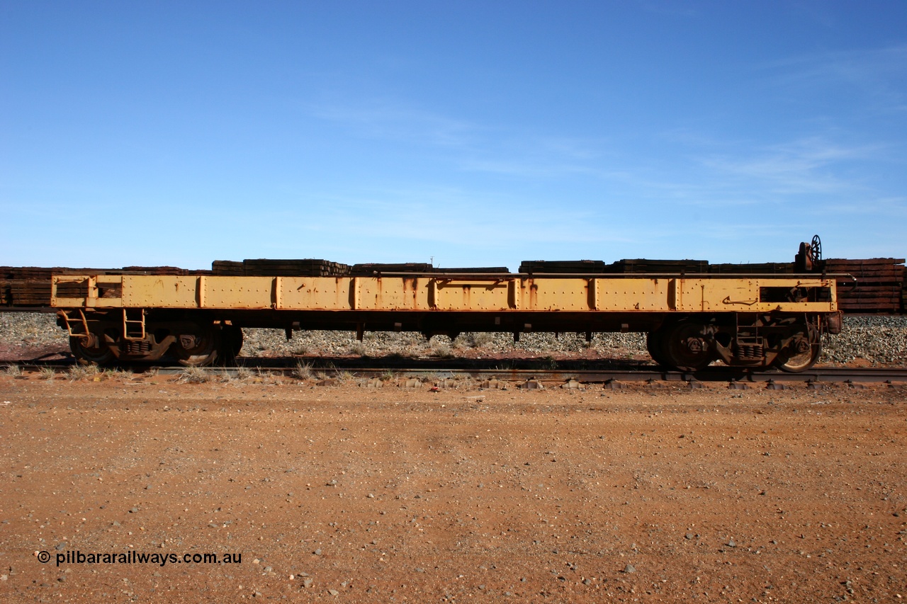 050518 2118
Flash Butt yard, heavily stripped down riveted waggon 206, possible original ballast waggon, number 206 was originally a waggon in the 'Camp Train' and appears to have USA origin, side view.
Keywords: BHP-flat-waggon;