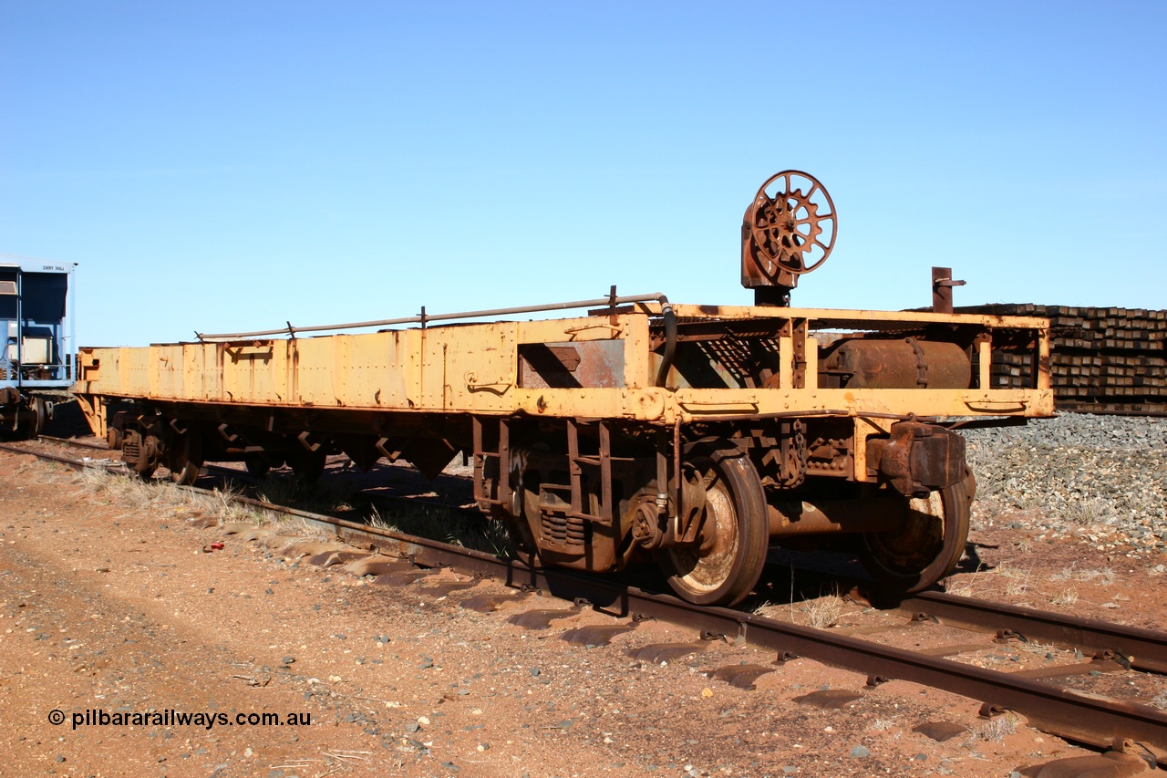 050518 2120
Flash Butt yard, heavily stripped down riveted waggon 206, possible original ballast waggon, number 206 was originally a waggon in the 'Camp Train' and appears to have USA origin, 3/4 view from handbrake end.
Keywords: BHP-flat-waggon;