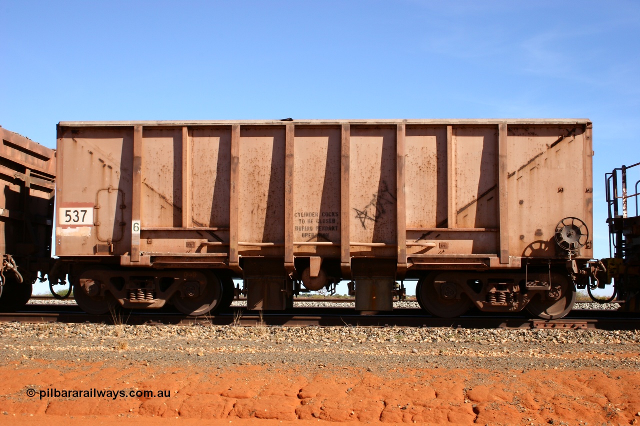 050518 2156
Bing Siding. Side view of 1963 built Magor USA waggon 537, originally in ore service before conversion to a ballast waggon.
Keywords: Magor-USA;BHP-ballast-waggon;