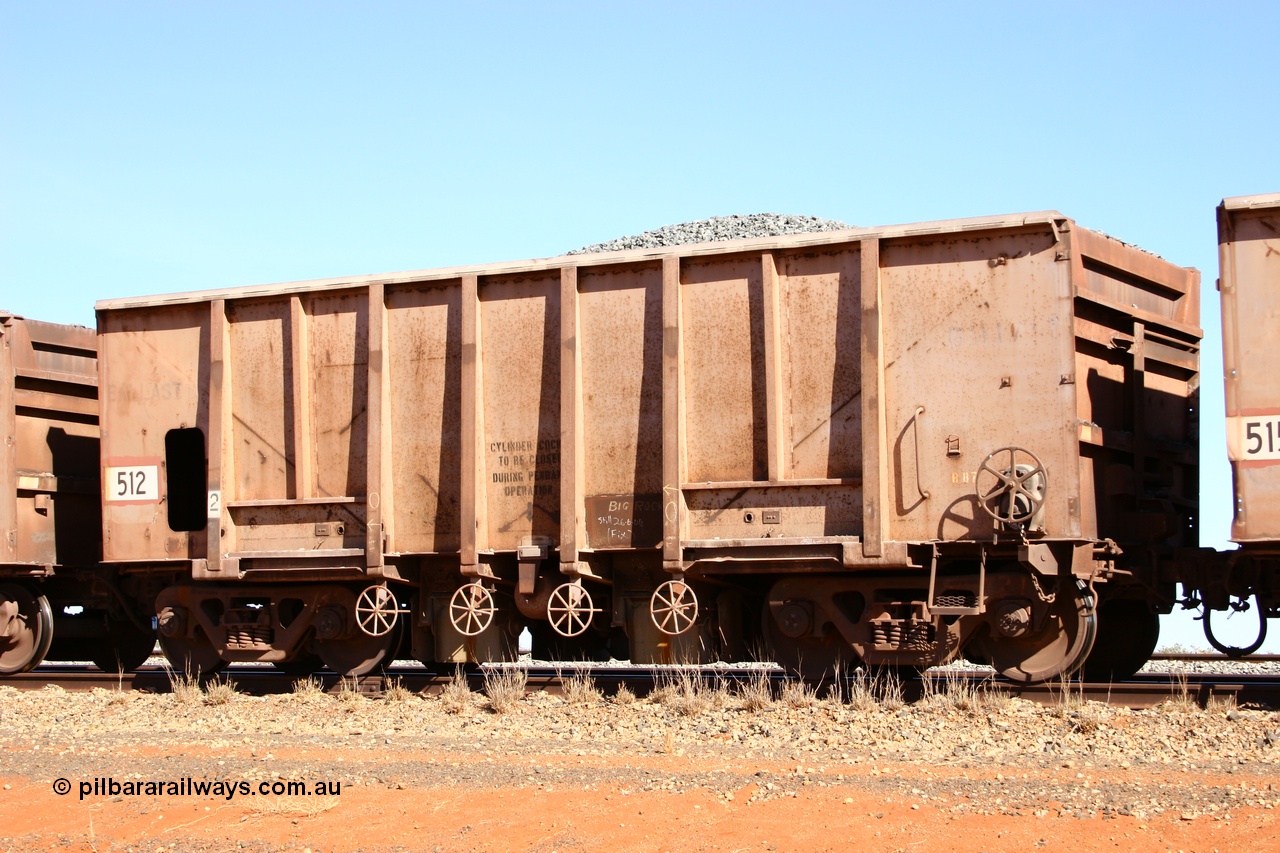 050518 2176
Bing Siding. 3/4 view of 1963 built Magor USA waggon 512, one of twenty waggons originally used on the Oroville Dam construction before coming to the Pilbara in January 1968 as ballast waggons.
Keywords: Magor-USA;BHP-ballast-waggon;