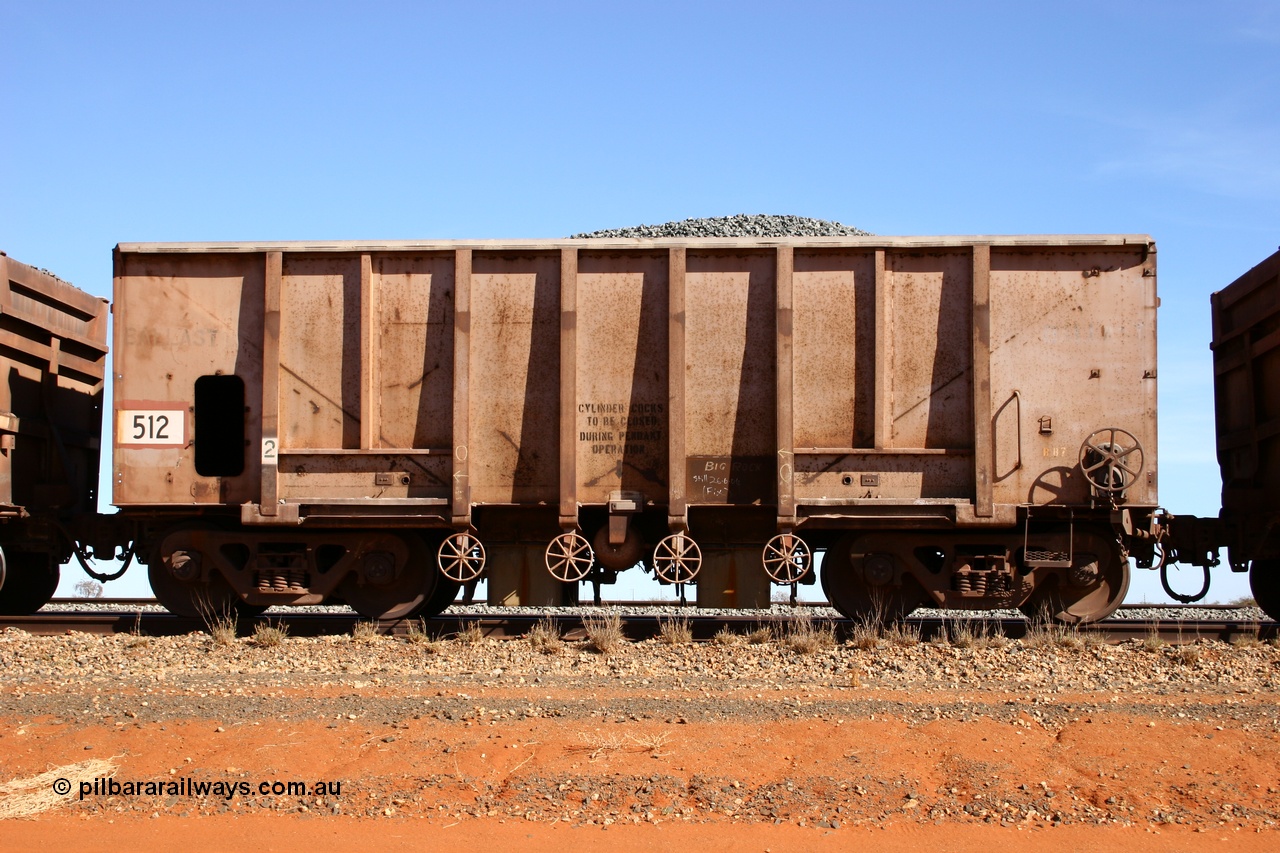 050518 2177
Bing Siding. Side view of 1963 built Magor USA waggon 512, one of twenty waggons originally used on the Oroville Dam construction before coming to the Pilbara in January 1968 as ballast waggons.
Keywords: Magor-USA;BHP-ballast-waggon;