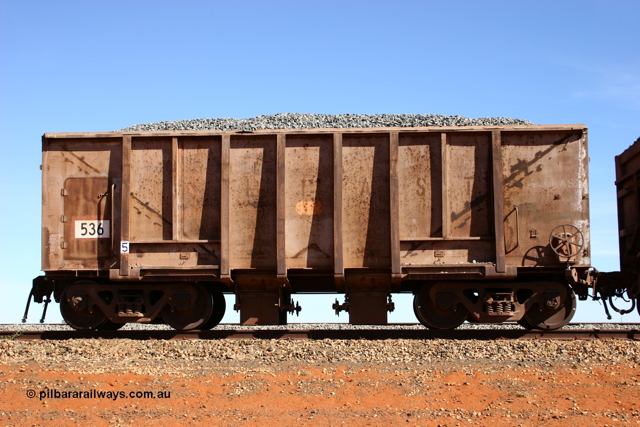 050518 2199
Bing Siding. Side view of 1963 built Magor USA waggon 536, originally in ore service before conversion to a ballast waggon.
Keywords: Magor-USA;BHP-ballast-waggon;