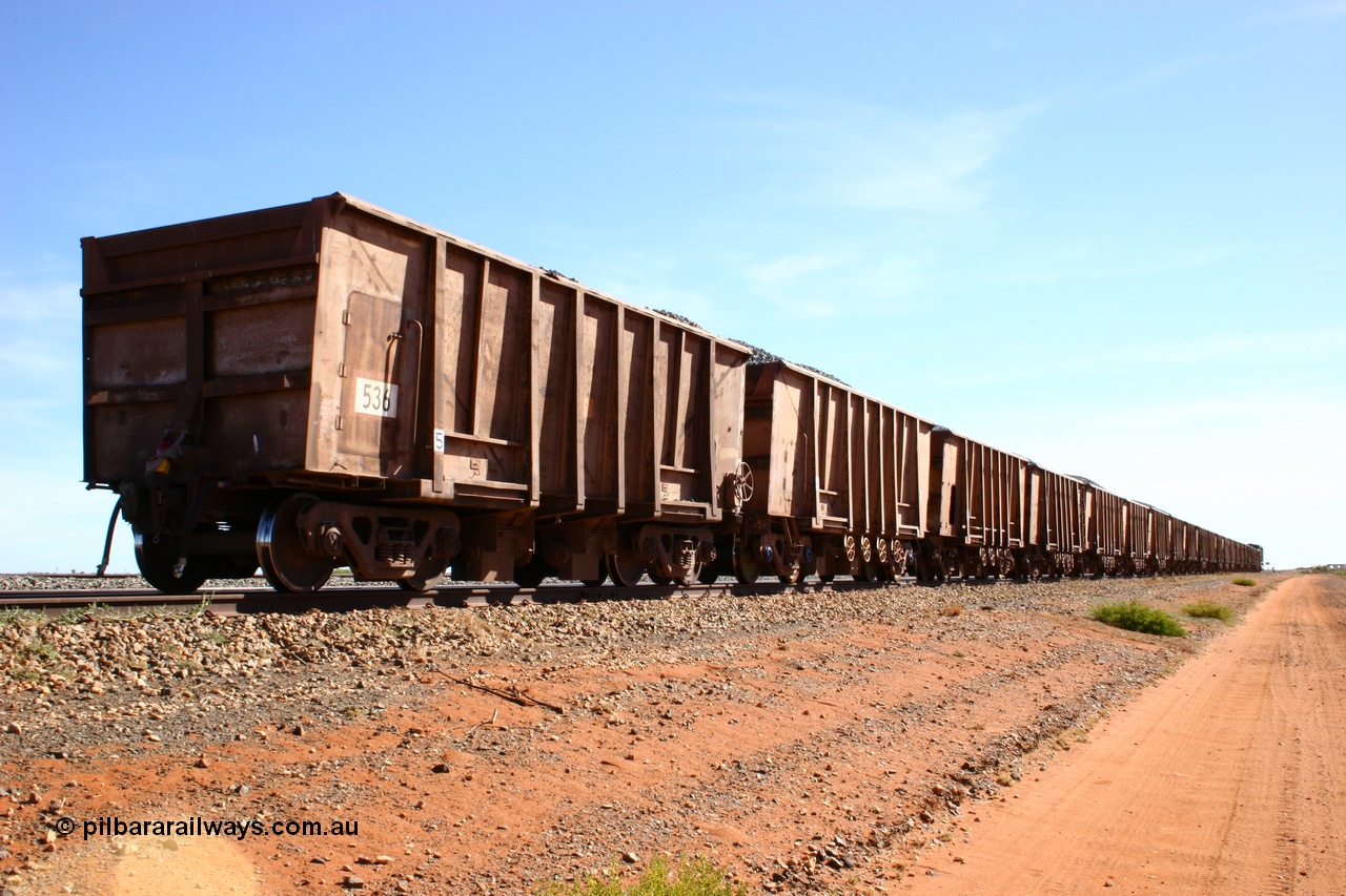 050518 2202
Bing Siding. Rear 3/4 view of ballast train and of 1963 built Magor USA waggon 536, originally in ore service before conversion to a ballast waggon.
Keywords: Magor-USA;BHP-ballast-waggon;