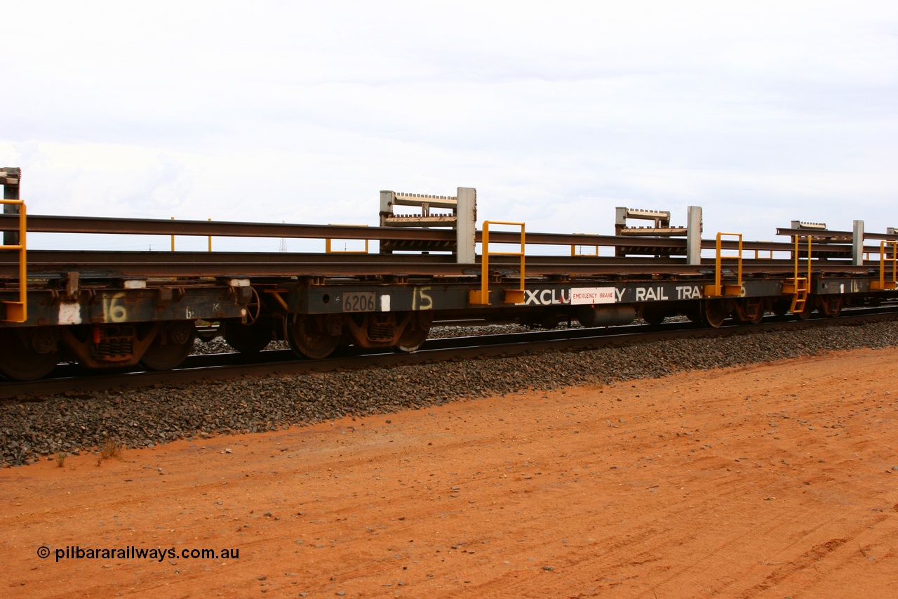 050522 2725
Goldsworthy Junction, rail recovery and transport train flat waggon #15, 6206 built by Comeng WA in January 1977 under order number 07-M-282 RY.
Keywords: Comeng-WA;BHP-rail-train;