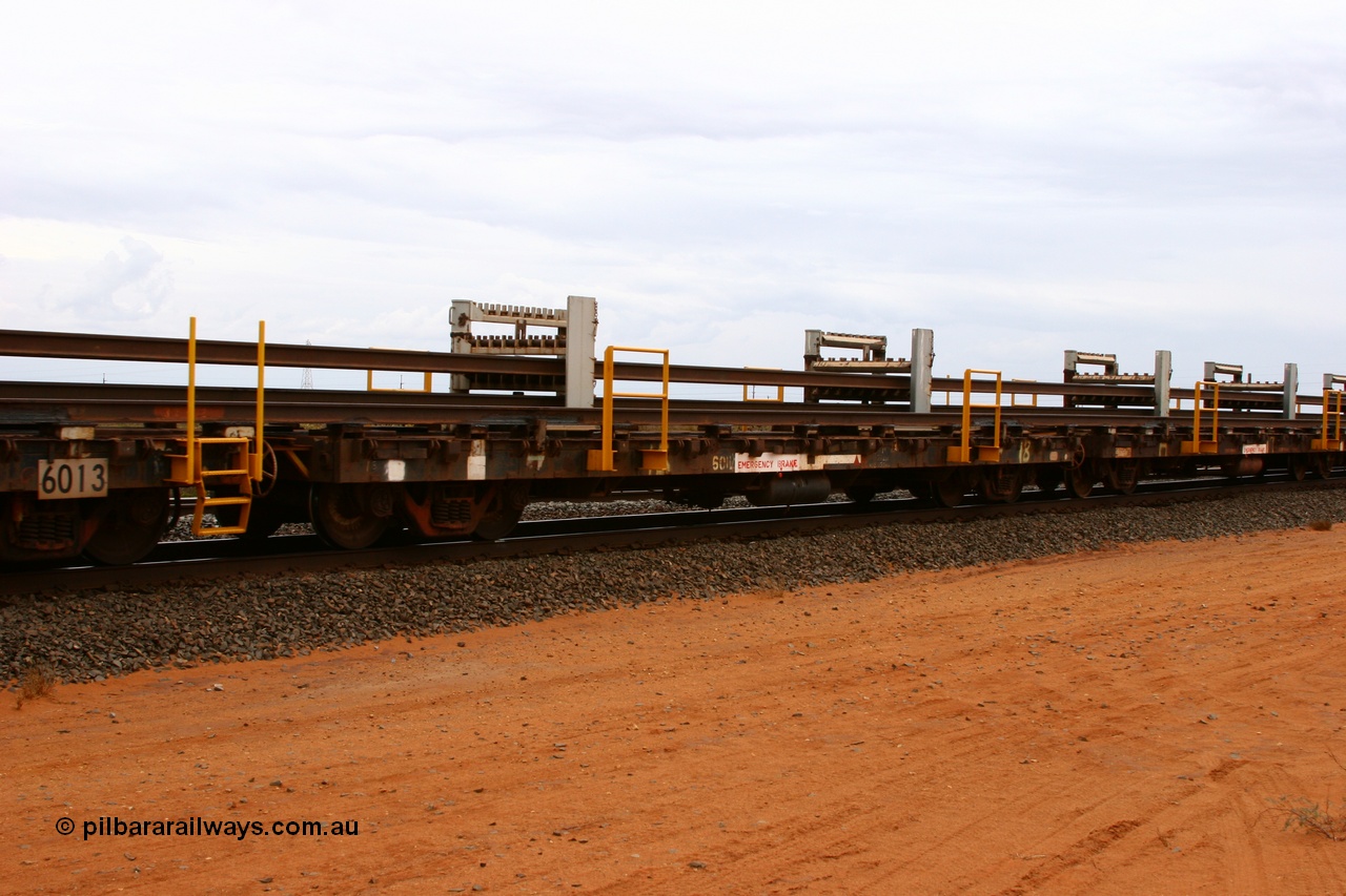 050522 2728
Goldsworthy Junction, rail recovery and transport train flat waggon #18, 6012, built by Scotts of Ipswich Qld in September 1970.
Keywords: Scotts-Qld;BHP-rail-train;