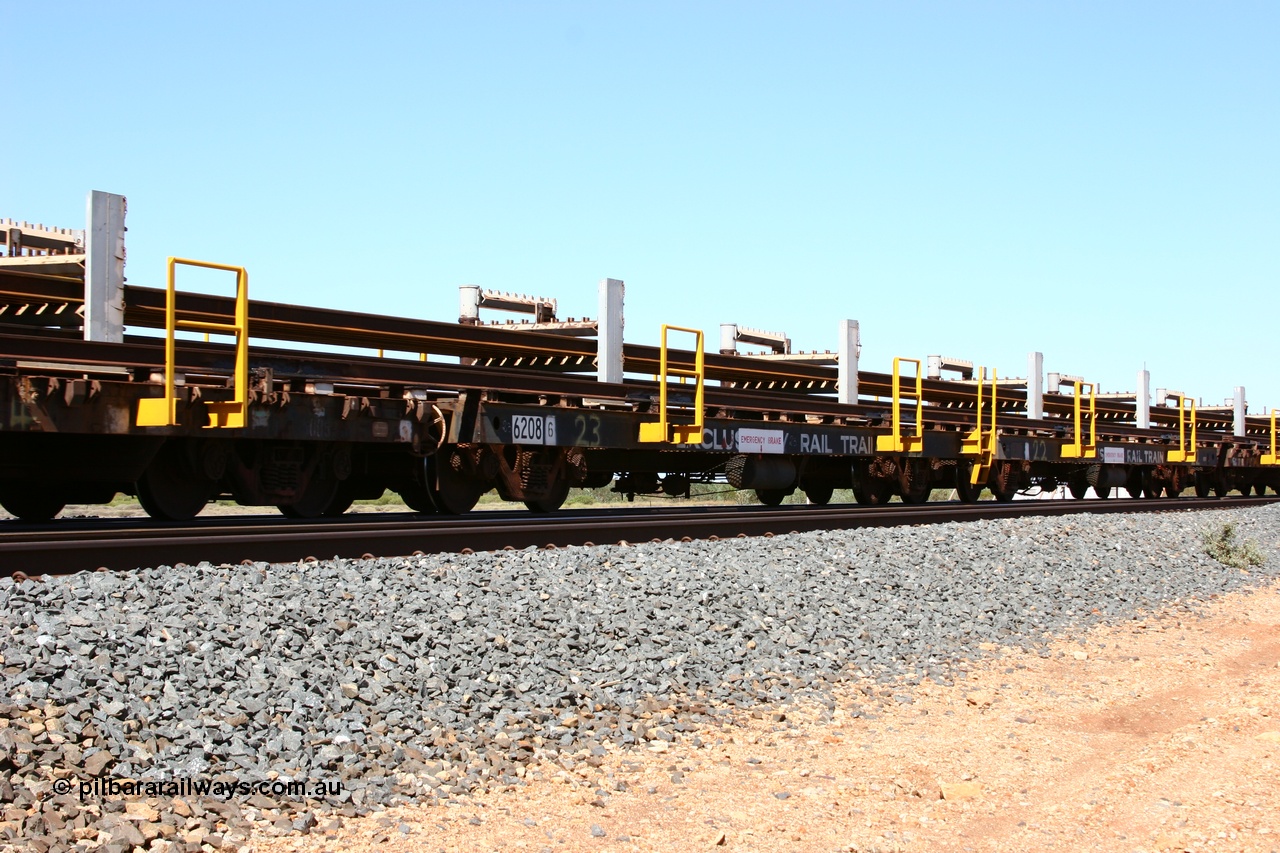050525 2991
Mooka Siding, rail recovery and transport train flat waggon #23, 6208, built by Comeng WA in February 1977 under order number 07-M-282 RY.
Keywords: Comeng-WA;BHP-rail-train;