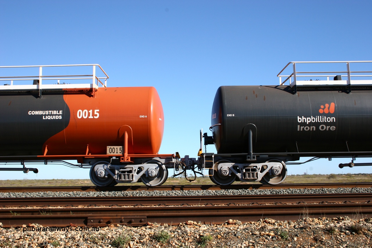 050704 3982
Bing Siding, empty 116 kL Comeng WA built tank waggon 0015 from 1974-5, one of six such tank waggons, detail of the A end and bogie and the B end of 0018, both wearing the BHP Billiton Earth livery.
Keywords: Comeng-WA;BHP-tank-waggon;