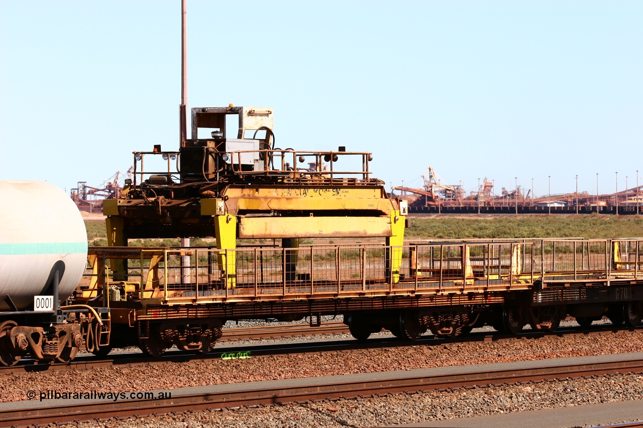 050724 4228
Nelson Point yard, flat waggon #6? in service on the Pony re-laying train as a transport waggon for a gantry car as pictured. Originally in service with Goldsworthy Mining as a BC or BCV box van, built by Comeng WA in 1966.
Keywords: Comeng-WA;GML;BHP-pony-waggon;