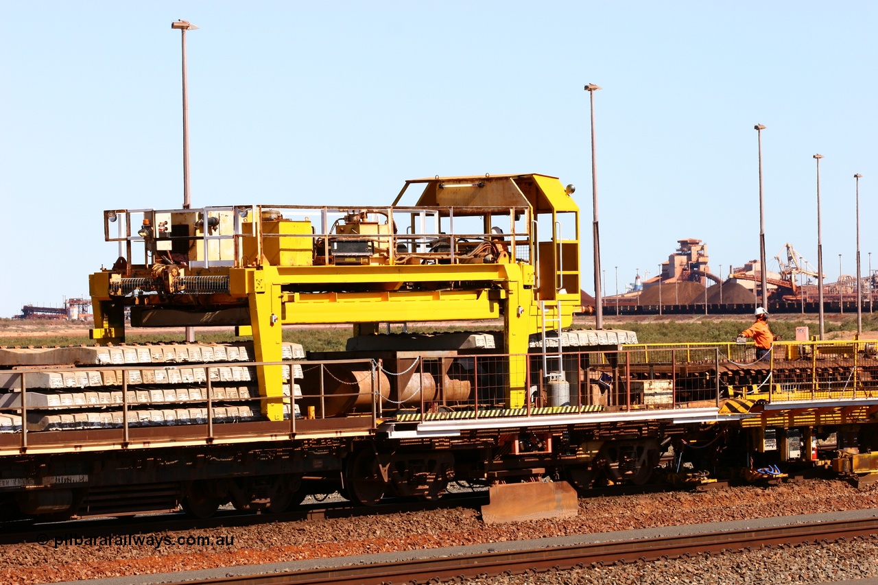 050724 4243
Nelson Point yard, flat waggons in service on the Pony re-laying train as transport waggons for sleepers, with a gantry car sitting atop a heavily modified and cut down Oroville waggon, with the left waggon a Scotts of Ipswich built flat waggon from in 1970 for then Mt Newman Mining Company.
Keywords: Scotts-Qld;BHP-pony-waggon;