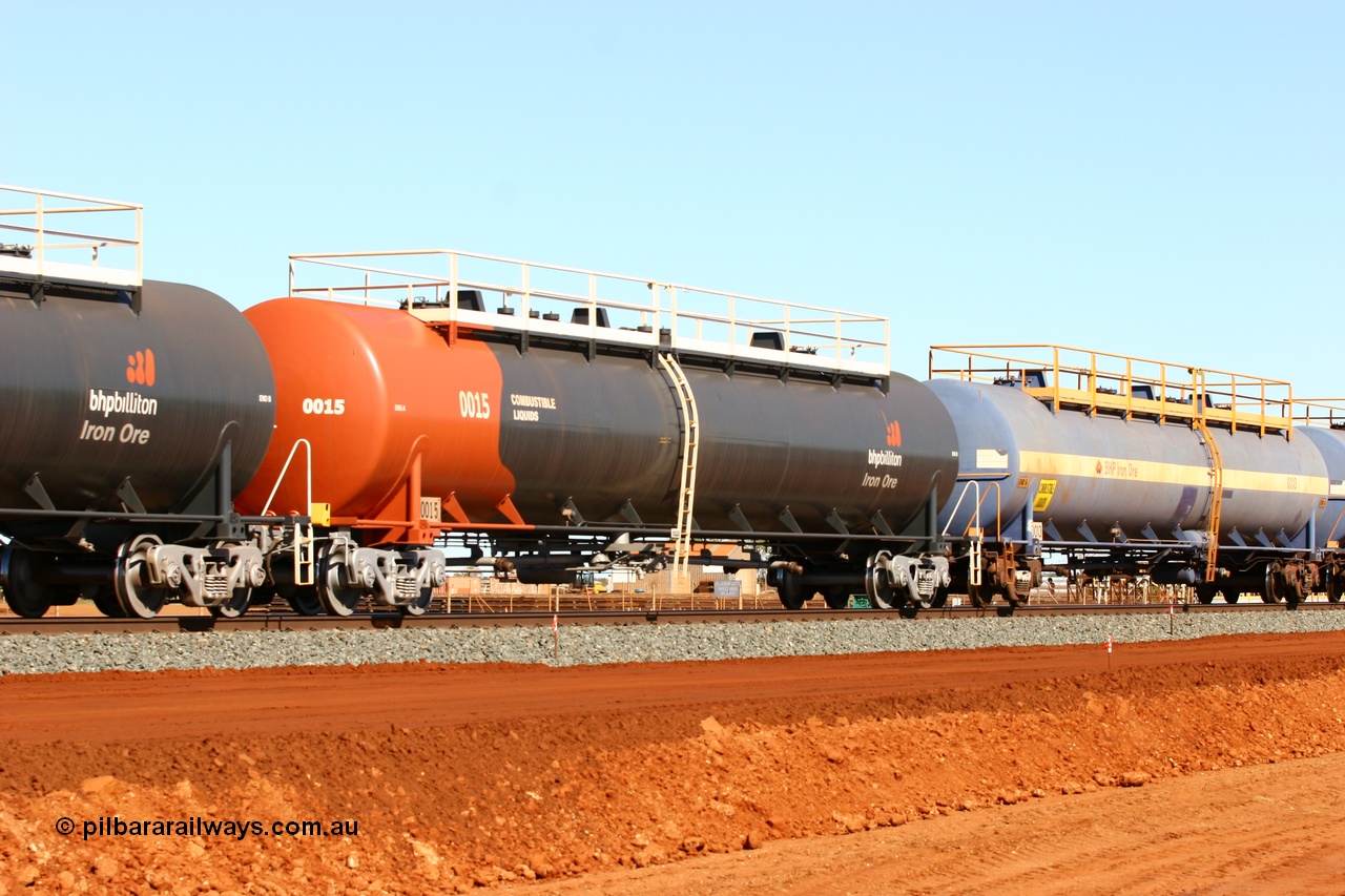 050724 4308
Bing Siding, empty fuel tank waggon 0015, a Comeng WA built 116 kilolitre tank waggon, one of a batch of six built in 1974-75 wearing the newer corporate 'Earth' livery of BHP Billiton Iron Ore.
Keywords: Comeng-WA;BHP-tank-waggon;