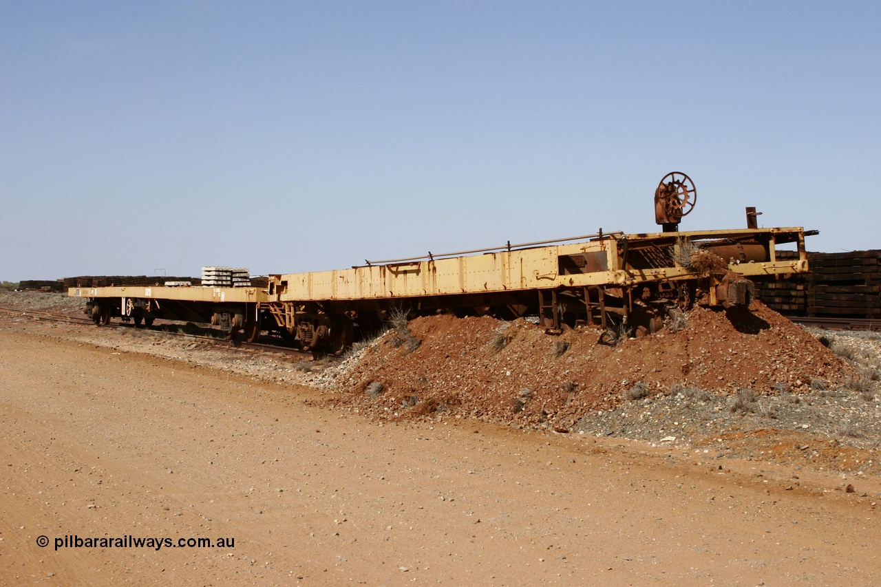 051001 5625
Flash Butt yard, heavily stripped down riveted waggon 206, possible original ballast waggon, number 206 was originally a waggon in the 'Camp Train' and appears to have USA origin, pushed into an earth bund.
Keywords: BHP-flat-waggon;