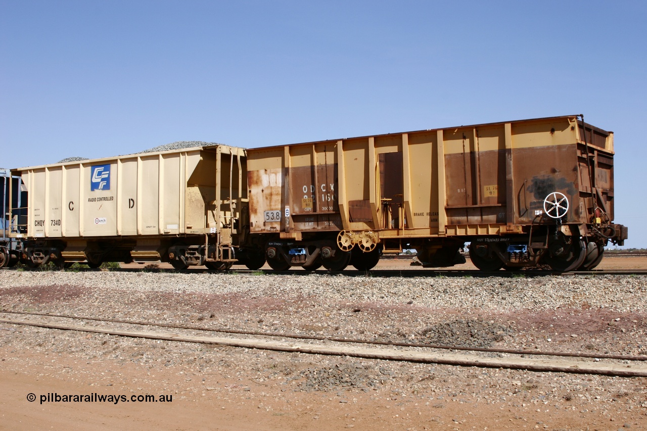 051001 5642
Flash Butt yard, side view of ballast plough converted from Magor USA built Oroville ore waggon 538, still visible is the ODCX 82160 number from original service building the Oroville Dam next to CFCLA ballast waggon CHQY class CHQY 734.
Keywords: Magor-USA;BHP-ballast-waggon;Mt-Newman-Mining-WS;