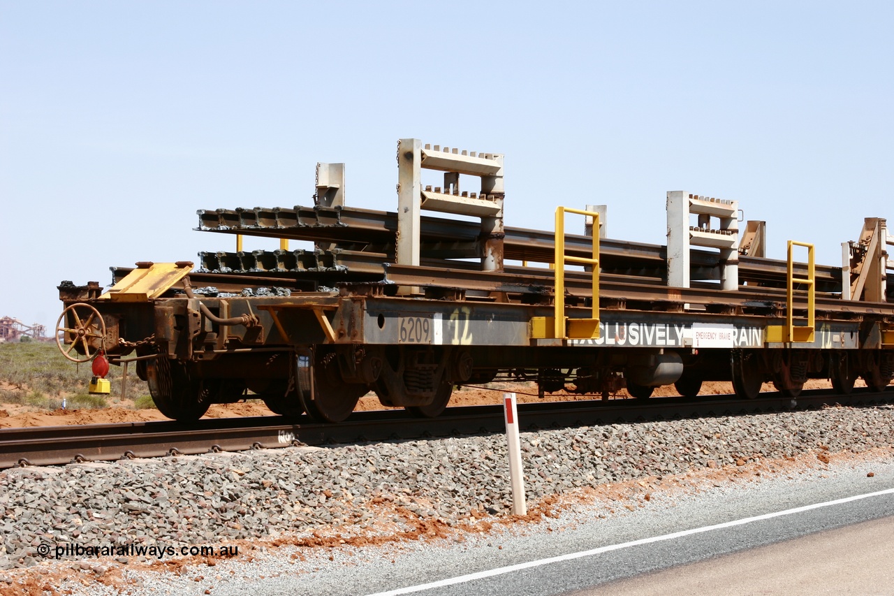 051001 5684
Boodarie, the Steel Train or rail recovery and transport train, flat waggon #12, 6209, a Comeng WA built flat waggon from January 1977 under order no. 07-M-282 RY.
Keywords: Comeng-WA;BHP-rail-train;