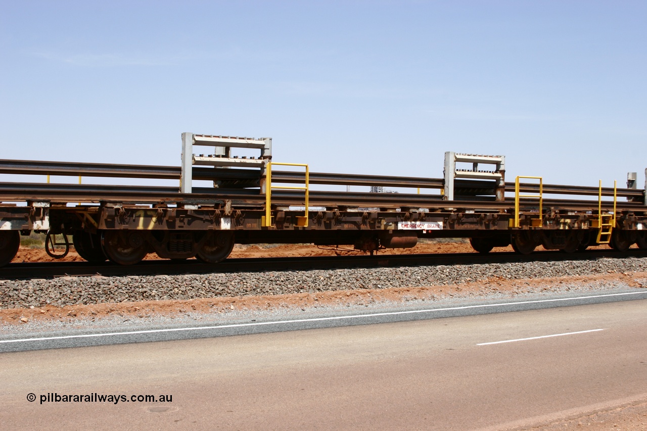 051001 5696
Boodarie, the Steel Train or rail recovery and transport train, flat waggon #17, 6016 a Comeng WA built flat waggon from 1971 which carries no. 6506-016.
Keywords: Comeng-WA;BHP-rail-train;