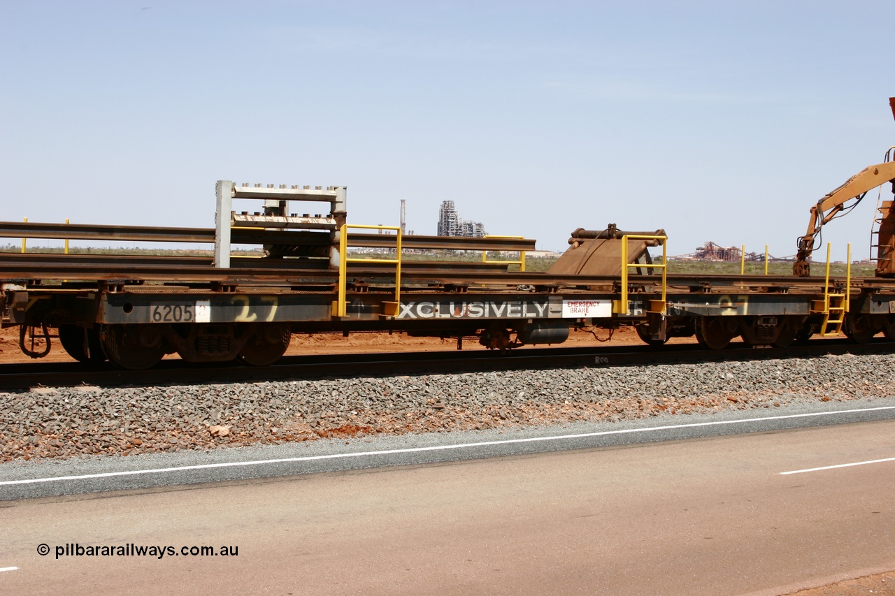 051001 5720
Boodarie, the Steel Train or rail recovery and transport train flat waggon #27, third lead off waggon, 6205, built by Comeng WA in February 1977 under order no. 07-M-282 RY.
Keywords: Comeng-WA;BHP-rail-train;