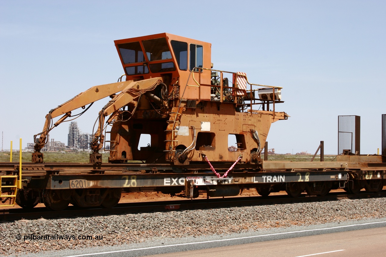 051001 5721
Boodarie, the Steel Train or rail recovery and transport train flat waggon #28, 2nd lead off waggon 6201, built by Comeng WA in January 1977 under order no. 07-M-282 RY, with the Gemco built straddle crane.
Keywords: Comeng-WA;BHP-rail-train;