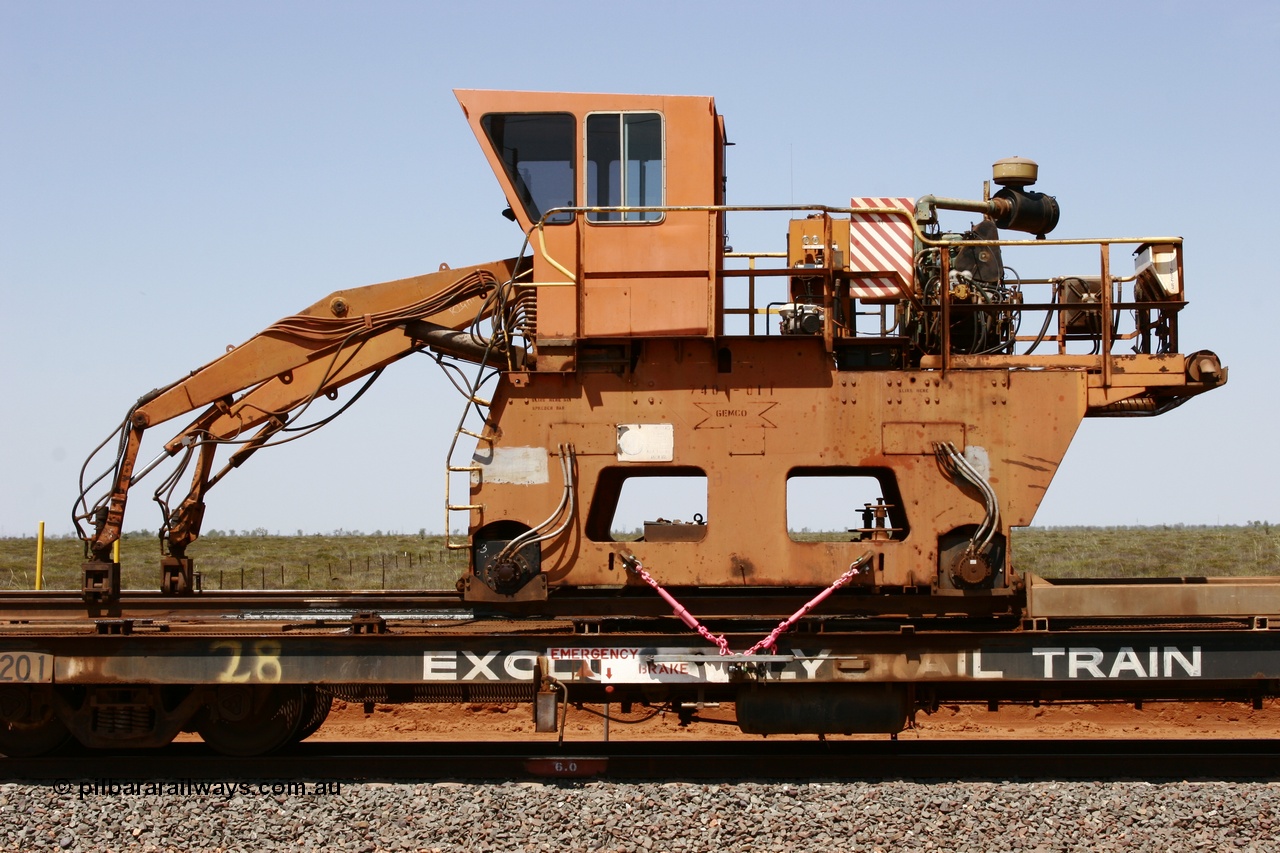 051001 5723
Boodarie, the Steel Train or rail recovery and transport train flat waggon #28, 2nd lead off waggon 6201, built by Comeng WA in January 1977 under order no. 07-M-282 RY, with the Gemco built straddle crane.
Keywords: Comeng-WA;BHP-rail-train;