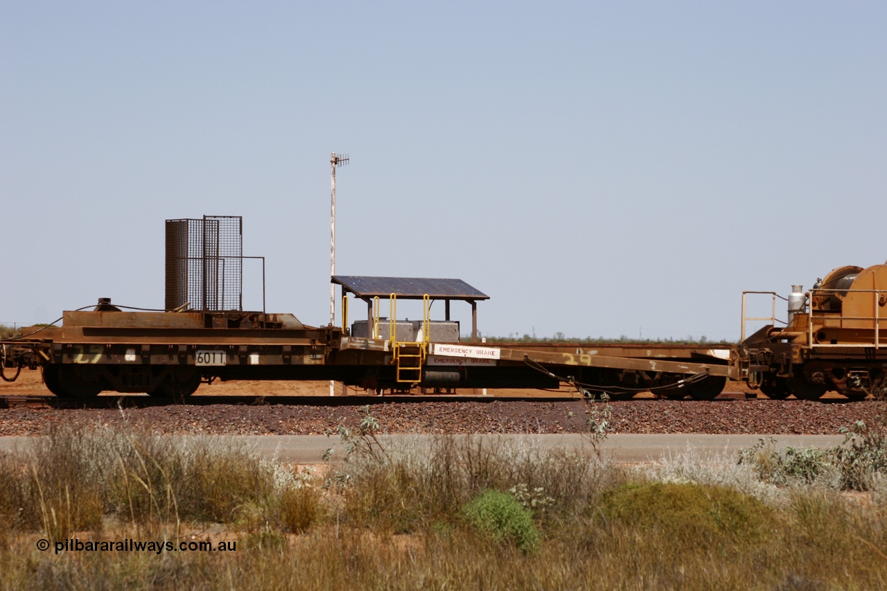 051001 5738
Boodarie, the Steel Train or rail recovery and transport train, 1st lead off waggon 6011, built by Scotts of Ipswich 04-09-1970, the mesh guarding is for the winch cable. The chute arrangement for the discharging and recovery of rail is visible.
Keywords: Scotts-Qld;BHP-rail-train;