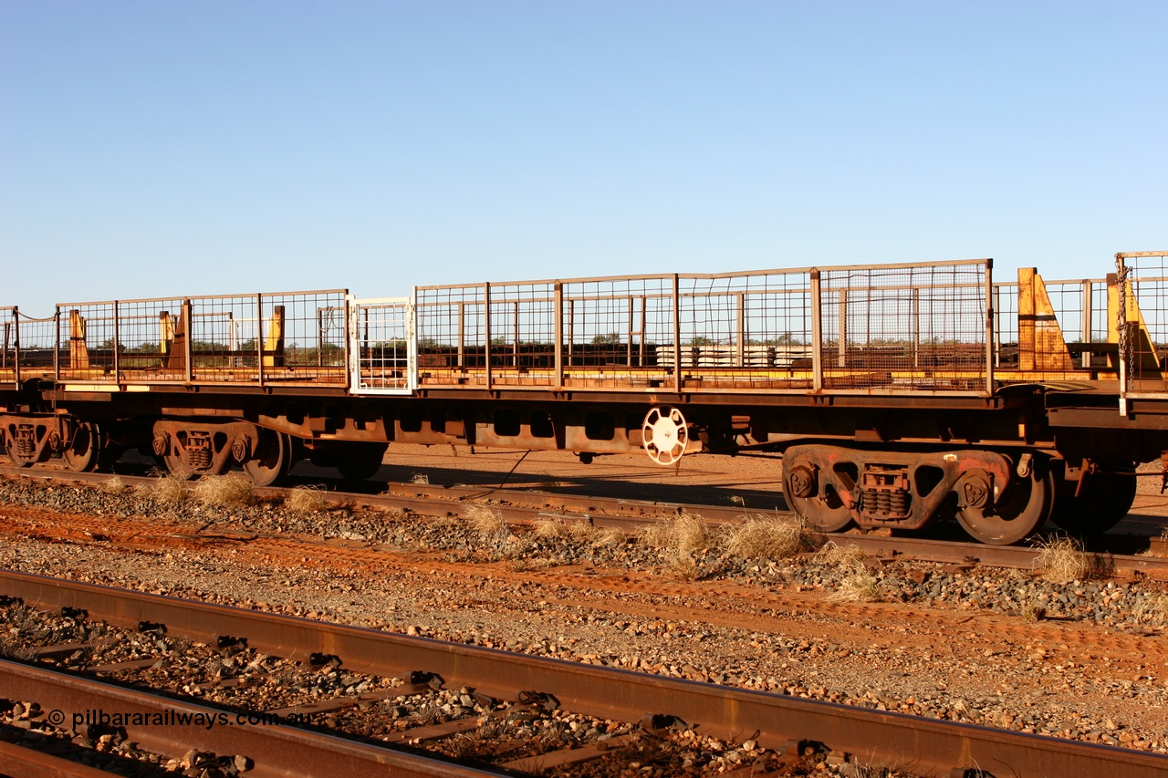 060429 3736
Flash Butt yard, Pony re-laying waggon, 6001 originally built for Goldsworthy Mining as one of a batch of six with a 55 tonne rating by Tomlinson Steel in 1966 of which three were sold to Mt Newman Mining in 1967 and numbered 6001-6003.
Keywords: BHP-pony-waggon;Tomlinson-Steel-WA;GML;