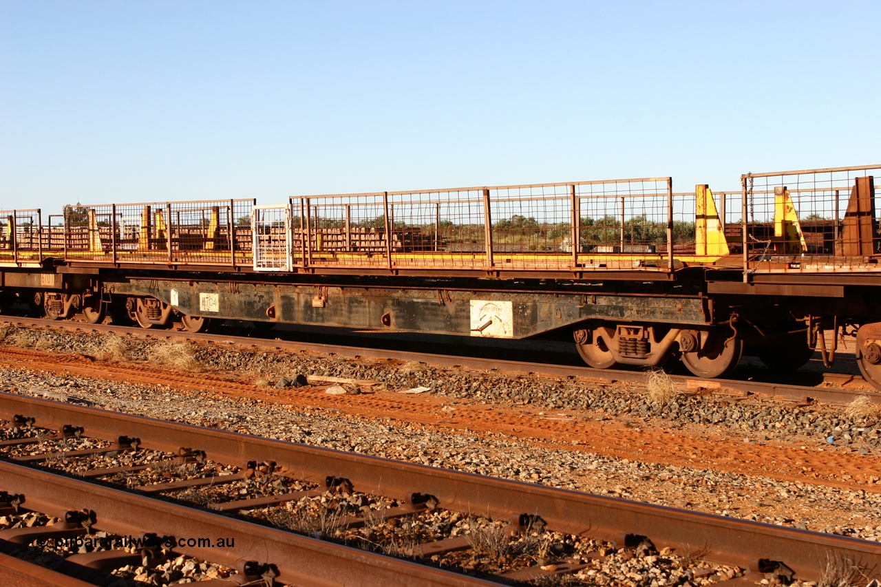 060429 3740
Flash Butt yard, Pony re-laying waggon 6704 flat waggon, unsure of history or who built it or where it came from, it looks to be heavy duty with riveted side frames and an odd handbrake arrangement.
Keywords: BHP-pony-waggon;
