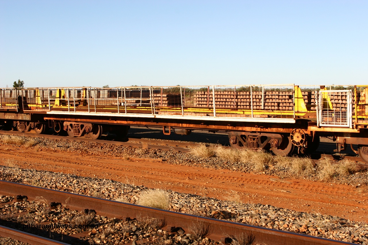 060429 3744
Flash Butt yard, Pony re-laying flat waggon, in service as a transport waggon for a gantry car and sleepers. Originally in service with Goldsworthy Mining as a BC or BCV box van, built by Comeng WA in 1966.
Keywords: Comeng-WA;GML;BHP-pony-waggon;