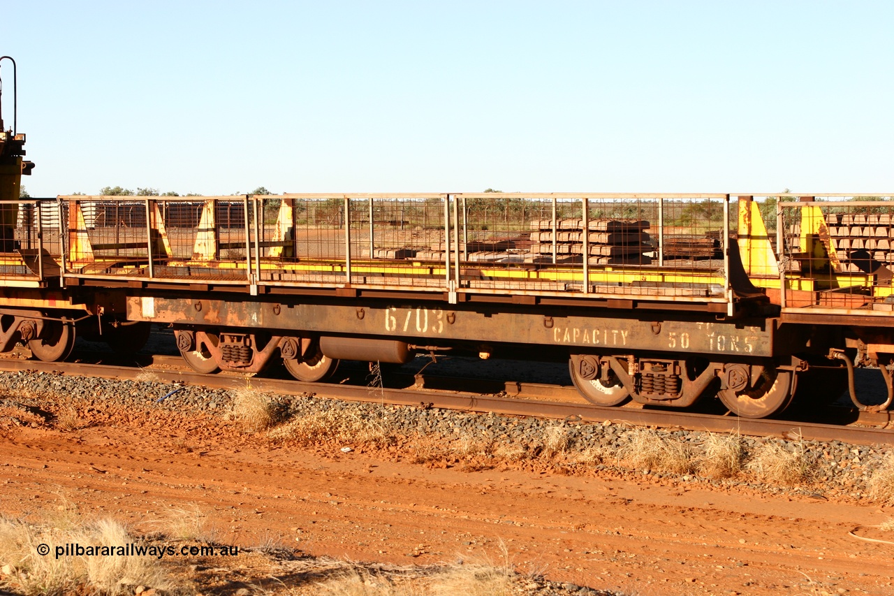 060429 3745
Flash Butt yard, Pony re-laying waggon 6703 is a heavily cut down and modified Magor USA ore waggon done by Mt Newman Mining workshops, converted to a 50 tonne flat waggon.
Keywords: BHP-pony-waggon;Magor-USA;Mt-Newman-Mining-WS;