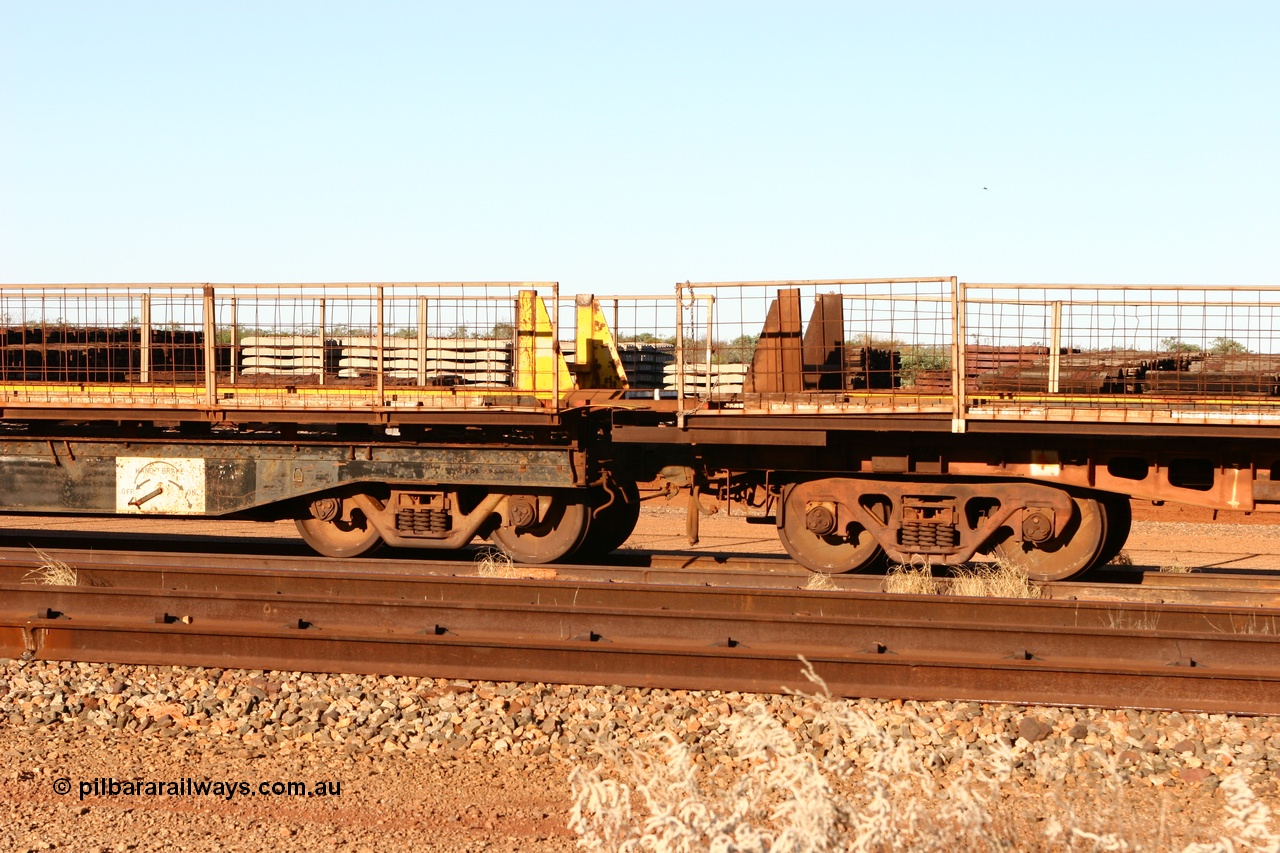 060429 3755
Flash Butt yard, Pony re-laying waggon 6704 special flat waggon on the left coupled to a former Goldsworthy Mining 55 tonnes flat waggon built by Tomlinson Steel from 1966.
Keywords: BHP-pony-waggon;