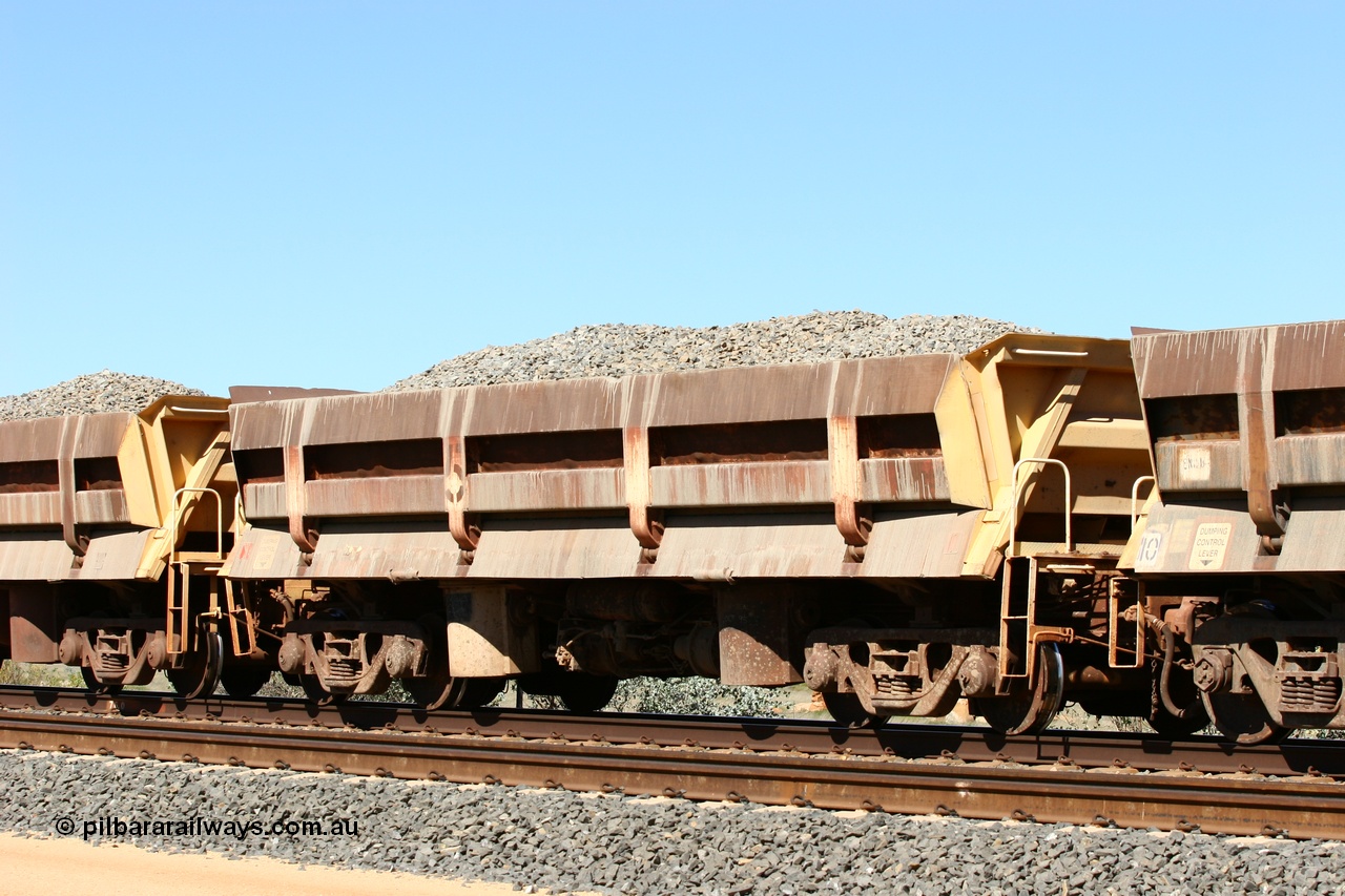 060501 3876
Tabba Siding, originally built by Difco USA for Goldsworthy Mining Ltd in 1967 as a batch of five, prefixed with 870 in BHP service, 8705 side dump waggon loaded with ballast.
Keywords: Difco-Ohio-USA;GML;BHP-ballast-waggon;