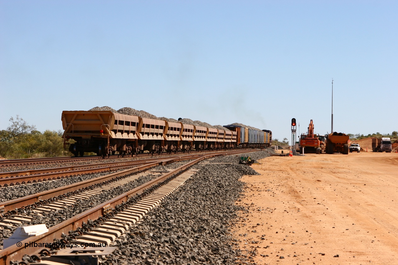 060501 3903
Tabba Siding, a string of Difco side dumps on the rear of a loaded ballast train.
Keywords: Difco-Ohio-USA;GML;BHP-ballast-waggon;