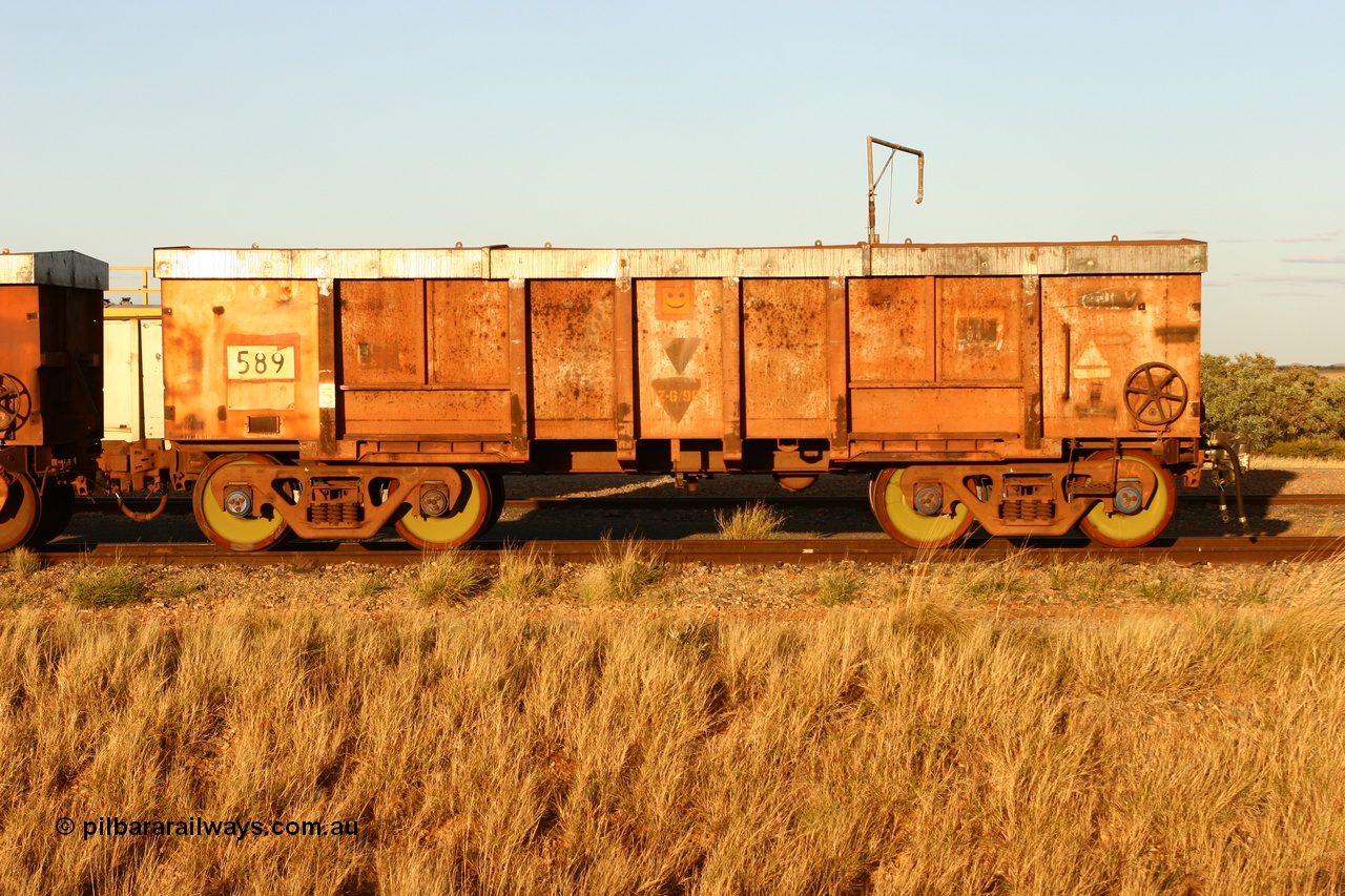 060618 6221
Flash Butt yard, modified original Magor USA built Oroville waggon 589, cut down and covered for use as indexing waggons at Finucane Island car dumpers, note the original ODCX marking visible.
Keywords: Magor-USA;Oroville;BHP-index-waggon;