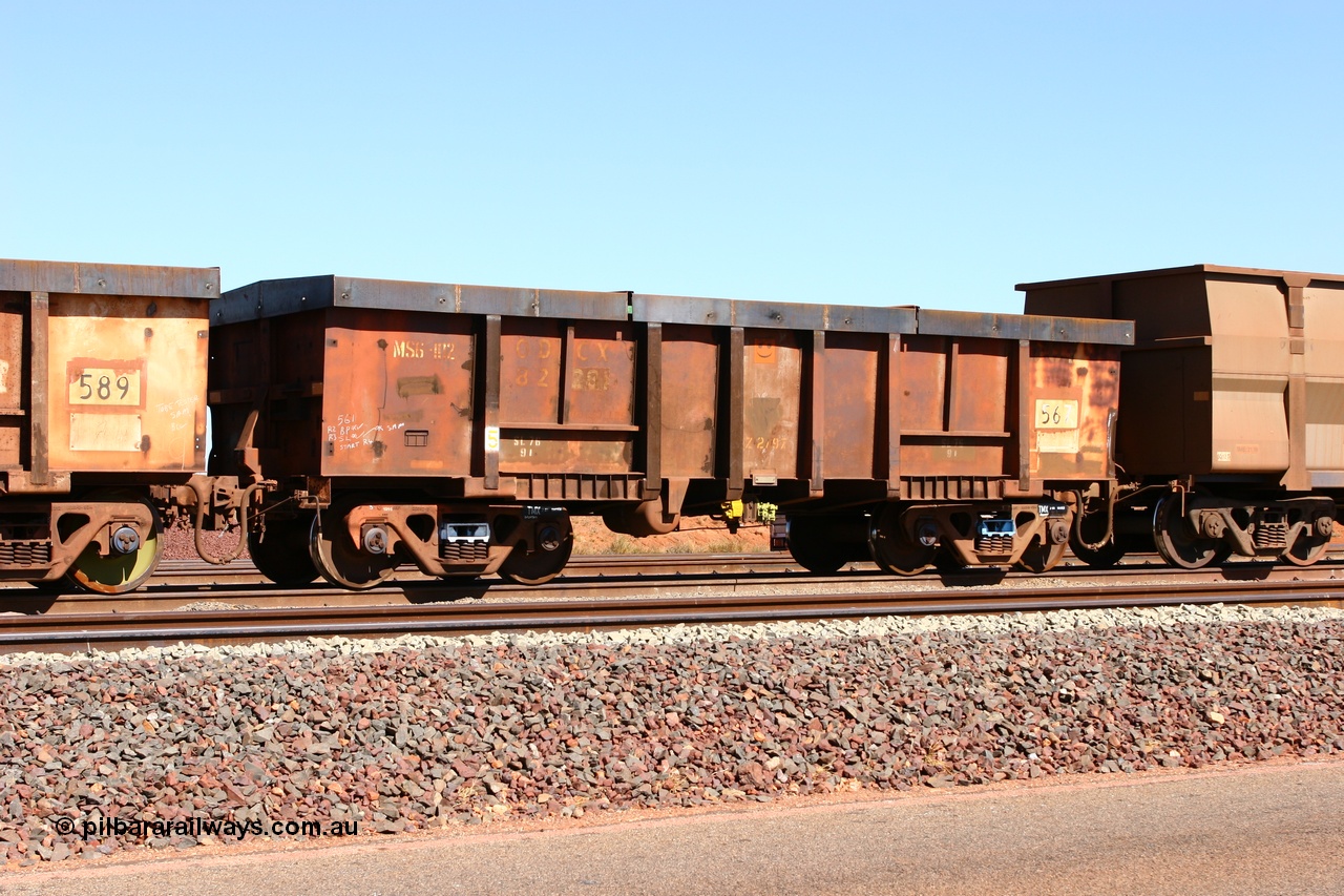 060710 6302
Boodarie Yard, modified original Magor USA built Oroville waggon 567, cut down and covered and in use as indexing waggons on the front of each rake for Finucane Island car dumpers, note the original ODCX marking visible.
Keywords: Magor-USA;Oroville;BHP-index-waggon;