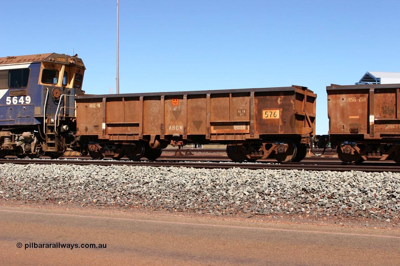 060713 6546
Boodarie Yard, modified original Magor USA built Oroville waggon 576, cut down and covered and in use as indexing waggons on the front of each rake for Finucane Island car dumpers, note the original ODCX marking visible.
Keywords: Magor-USA;Oroville;BHP-index-waggon;