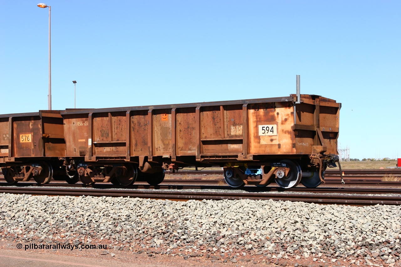 060713 6548
Boodarie Yard, modified original Magor USA built Oroville waggon 594, cut down and covered and in use as indexing waggons on the front of each rake for Finucane Island car dumpers, note the original ODCX marking visible.
Keywords: Magor-USA;Oroville;BHP-index-waggon;