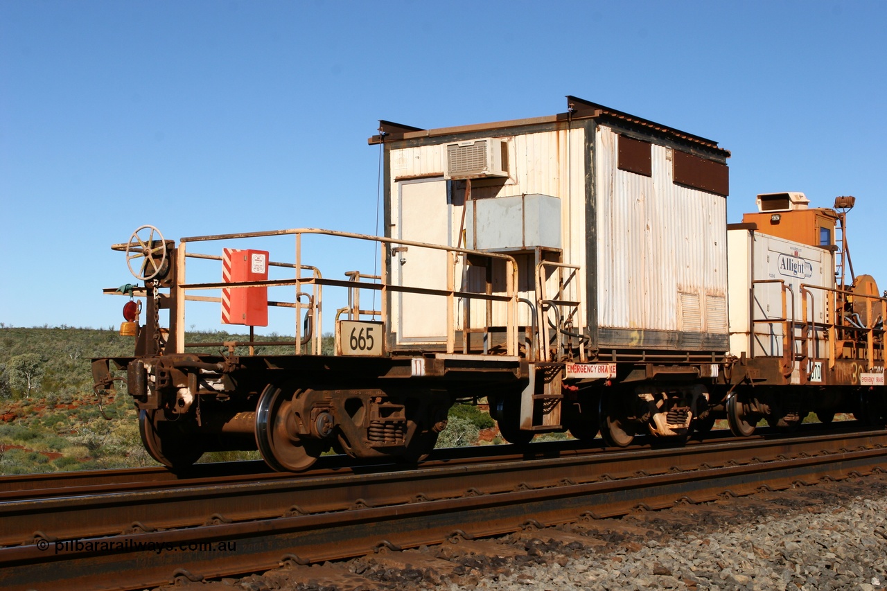 060714 6816
Hesta Siding, rail recovery and transport train, flat waggon 665, a cut down Magor USA built former Oroville Dam 91 ton ore waggon, used as the crib waggon on the steel train.
Keywords: Mt-Newman-Mining-WS;Magor-USA;BHP-rail-train;