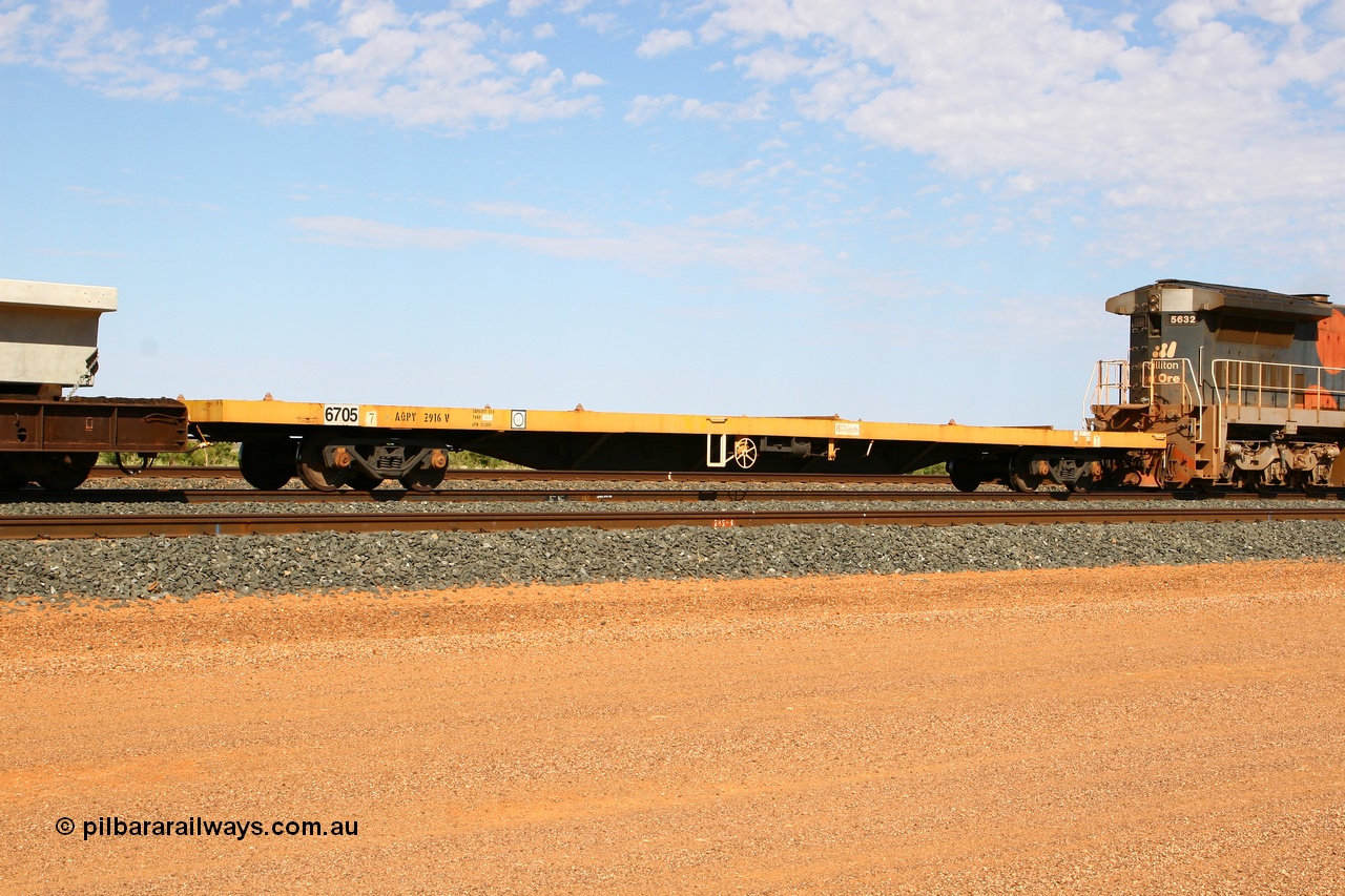 071202 1232
Turner Siding, CFCLA flat waggon AQPY type AQPY 2916, also carrying BHP road number 6705, a 55 tonne capacity waggon.
Keywords: 6705;AQPY-type;AQPY2916;CFCLA;BHP-flat-waggon;