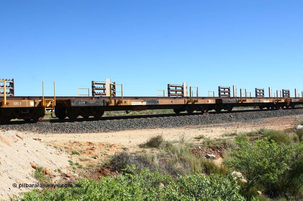 080621 2716
Tabba South, one of a batch of six flat waggons converted by Mt Newman Mining workshops by cutting down a pair of ore waggons to make one flat waggon, 6104 in service with the rail recovery and transport train as waggon #6.
Keywords: Mt-Newman-Mining-WS;Magor-USA;BHP-rail-train;