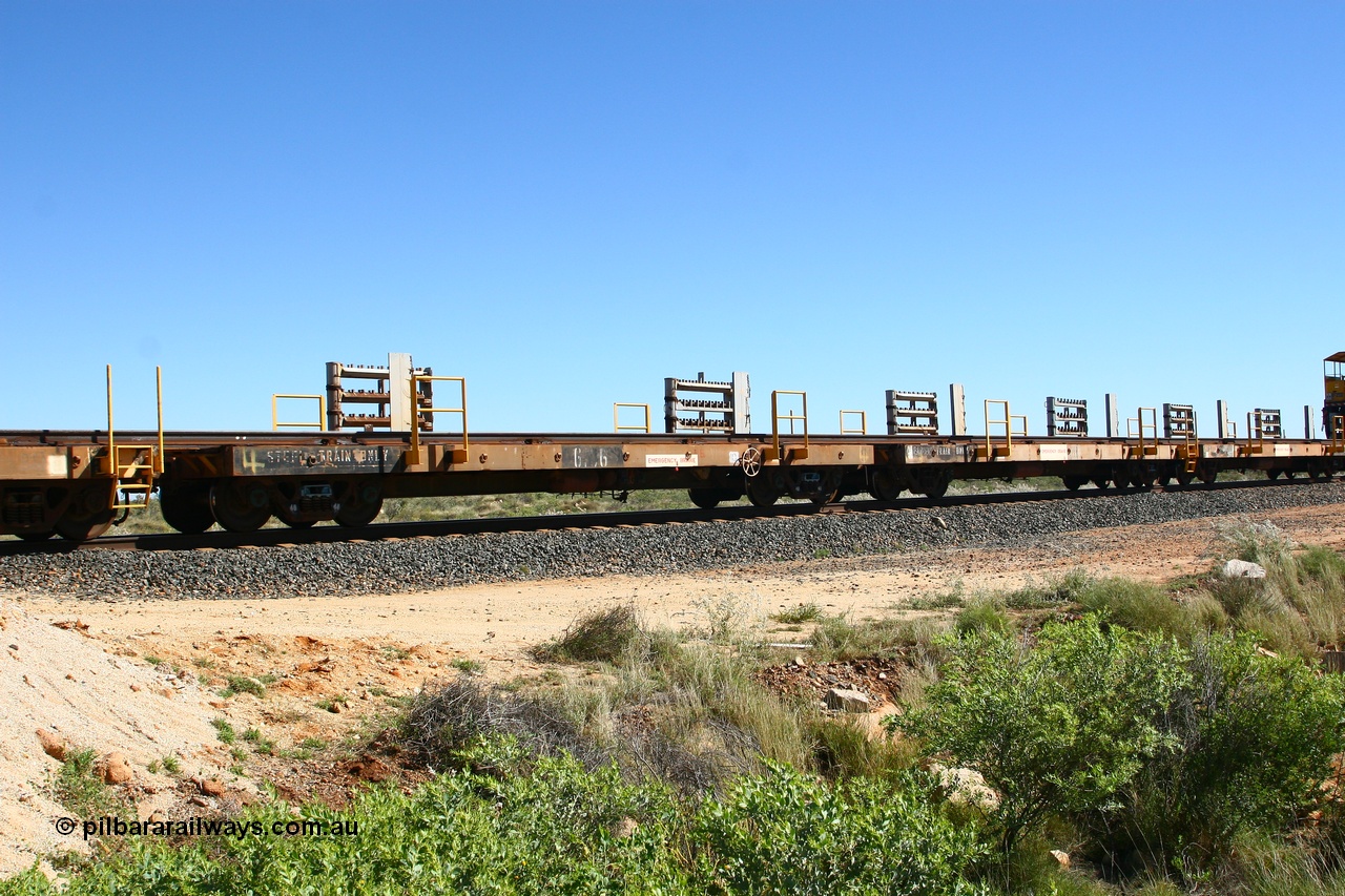 080621 2718
Tabba South, one of a batch of six flat waggons converted by Mt Newman Mining workshops by cutting down a pair of ore waggons to make one flat waggon, 6106 in service with the rail recovery and transport train as waggon #4.
Keywords: Mt-Newman-Mining-WS;Magor-USA;BHP-rail-train;