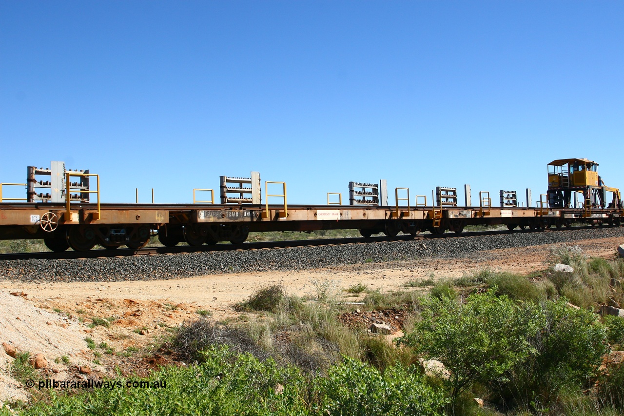 080621 2719
Tabba South, one of a batch of six flat waggons converted by Mt Newman Mining workshops by cutting down a pair of ore waggons to make one flat waggon, 6103 in service with the rail recovery and transport train as waggon #3.
Keywords: Mt-Newman-Mining-WS;Magor-USA;BHP-rail-train;